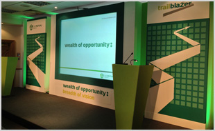 Conference stage with two podiums and mounted screens